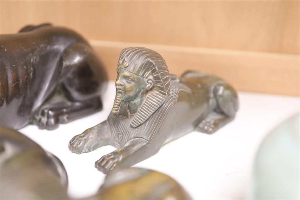 A small pair of bronze sphinx, another and a spelter ditto, tallest 20cm